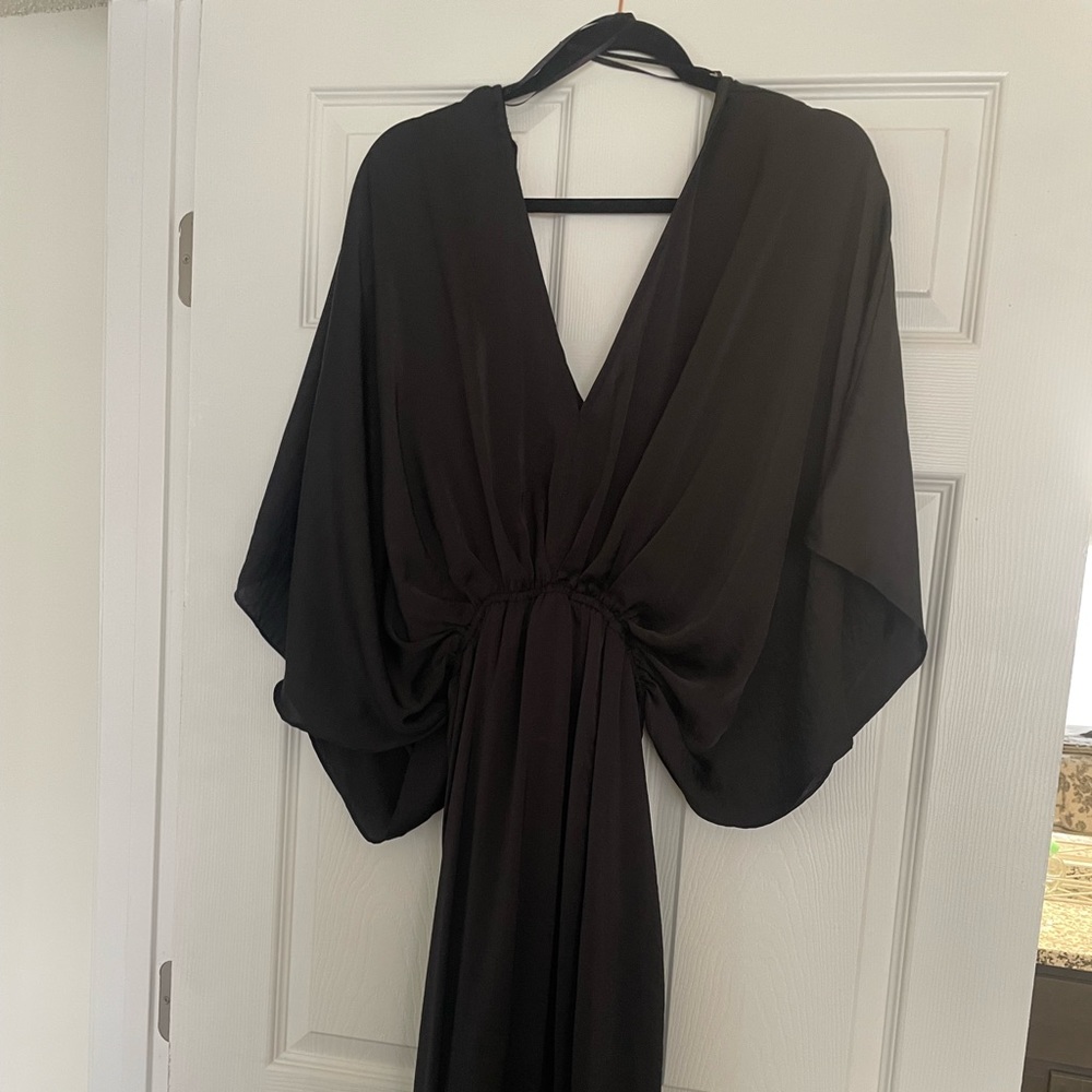 Long black evening dress with deep v front and back with ties.